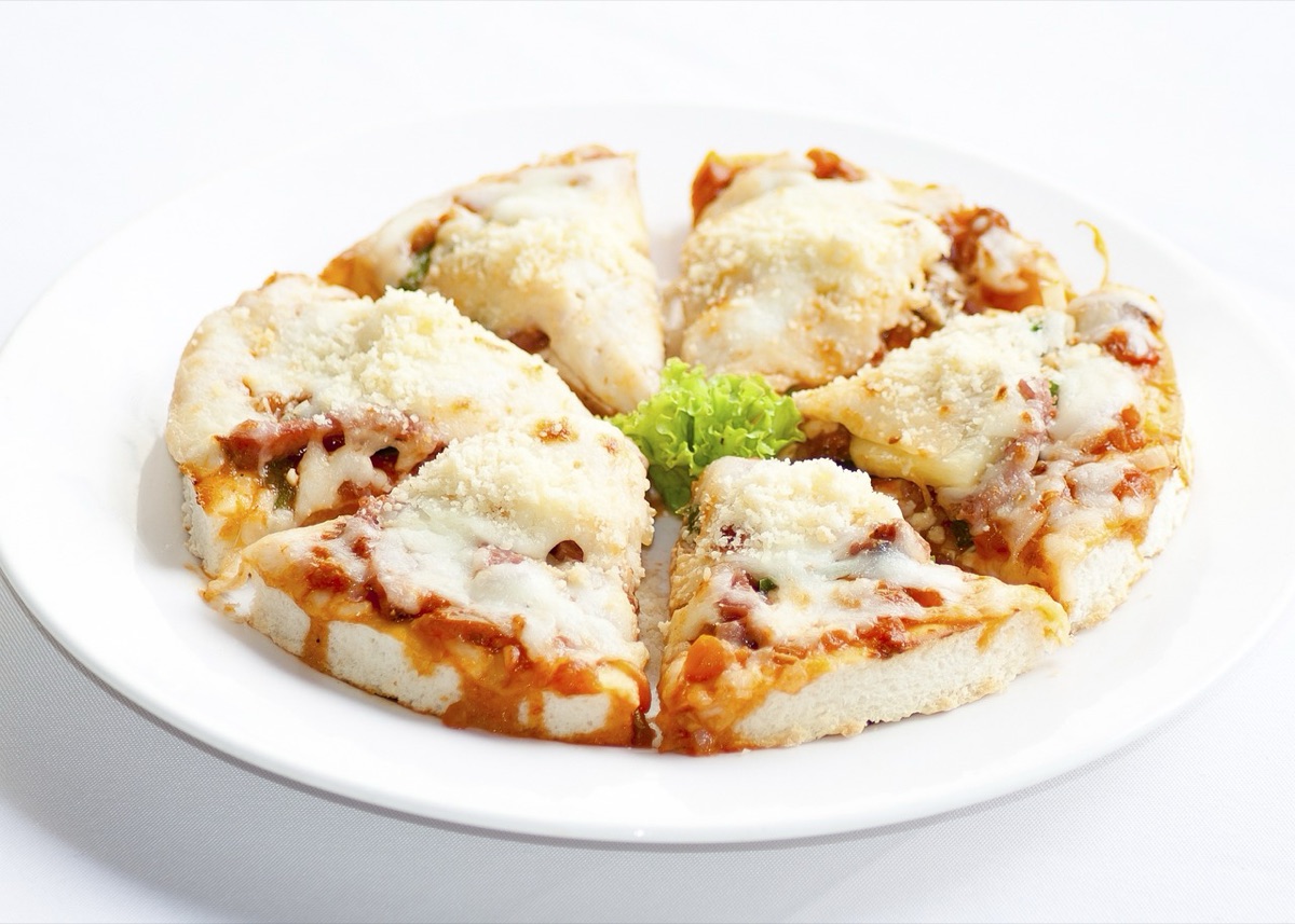 Pizza slice with tomato sauce and cheese